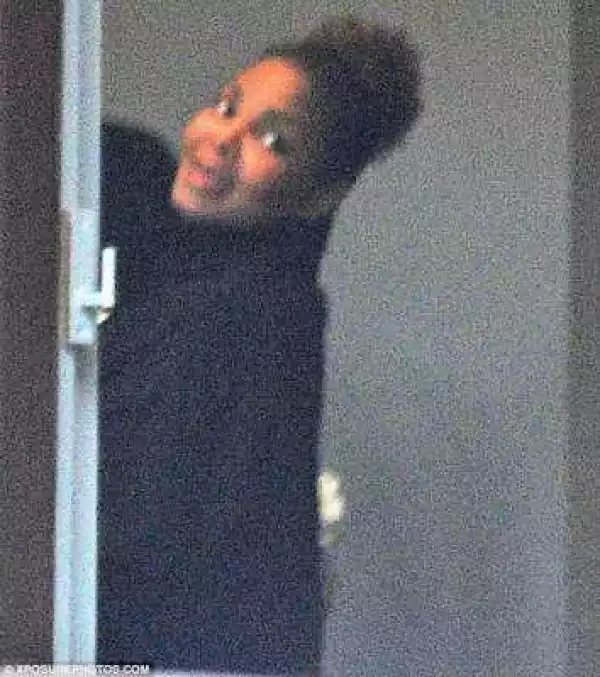 Pregnant Janet Jackson seen buying flowers in London